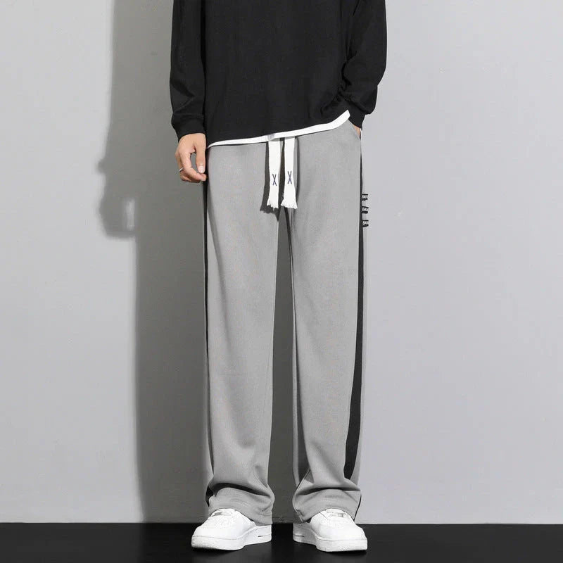 Comfortable striped straight-leg casual trousers in various colours and sizes