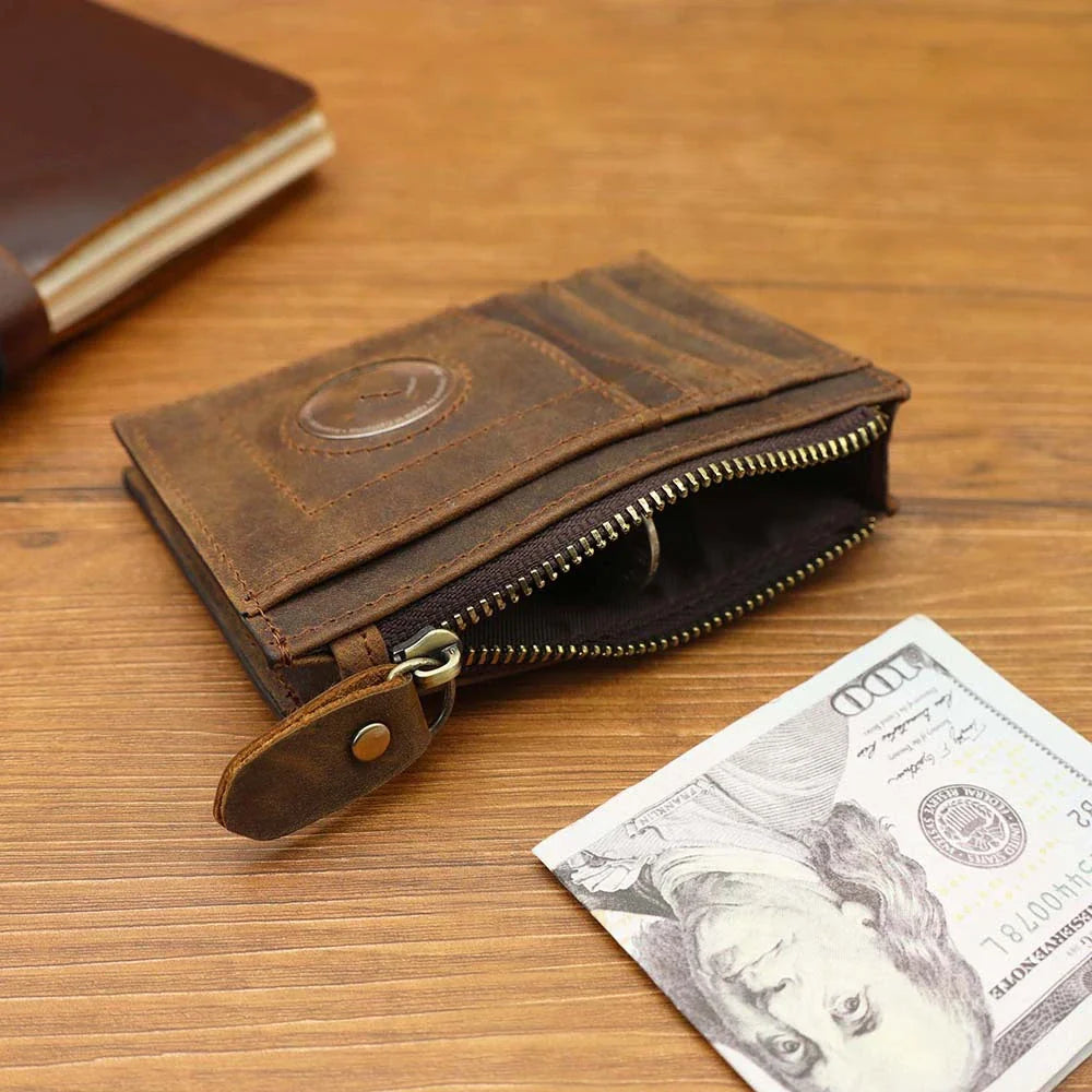Premium cowhide leather wallet with concealed compartments and zipper closure, designed for secure and organised storage of cards, cash and other essentials.