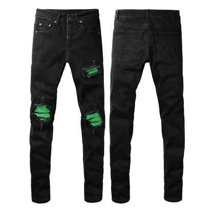 Premium ripped black jeans with stylish green patchwork design, made with medium-elastic fabric for comfort and a slim, flattering silhouette.