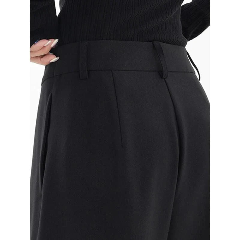 Stylish high-waisted wide-leg fashion trousers for women, made from a premium cotton-polyester blend for comfort and durability.