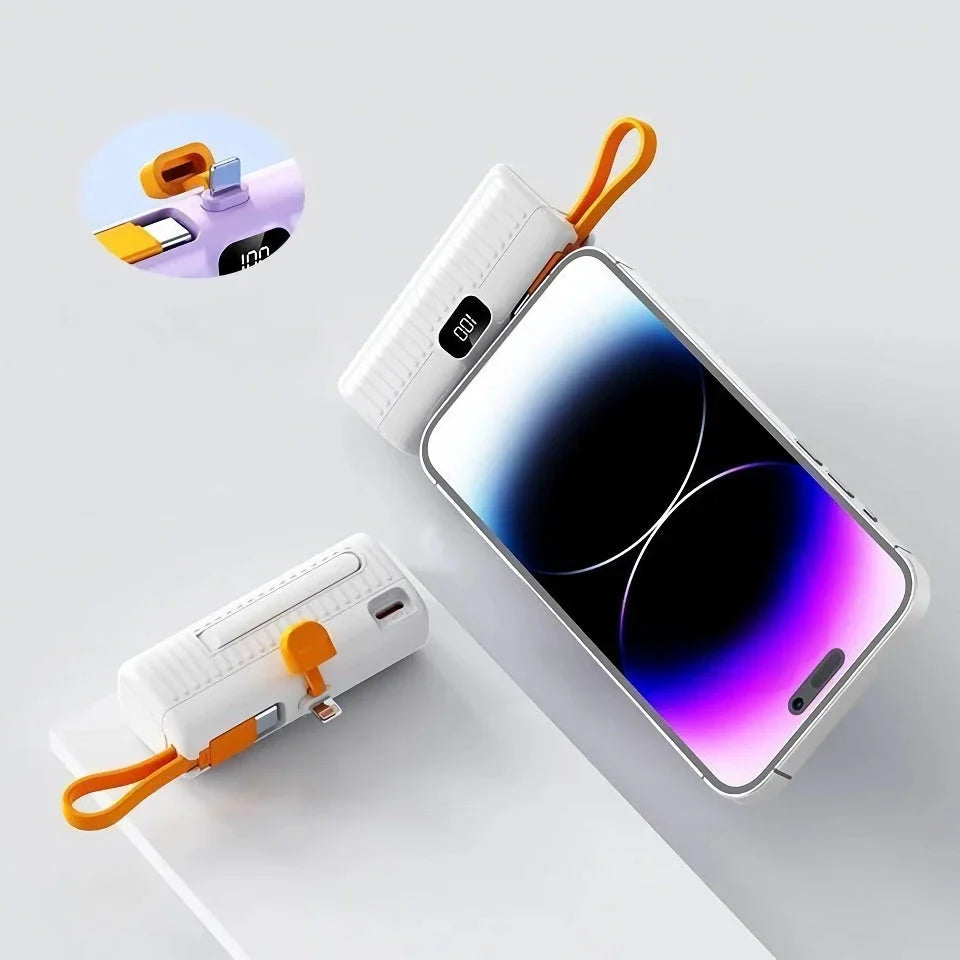 Compact, high-capacity power bank with dual charging ports and built-in cables for convenient, fast charging on the go