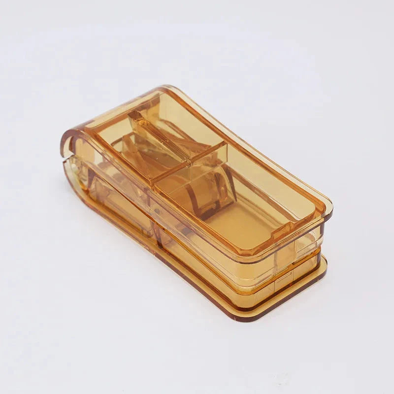 Compact Pill Splitter and Storage Organizer with Orange Colour, Featuring Precision Cutting Blade and Built-in Storage Compartment