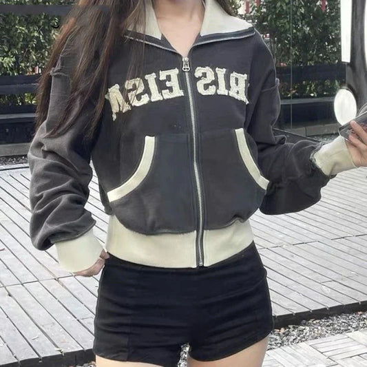 A premium retro-inspired women's sweater jacket made of high-quality polyester with a loose, comfortable fit and a timeless design.