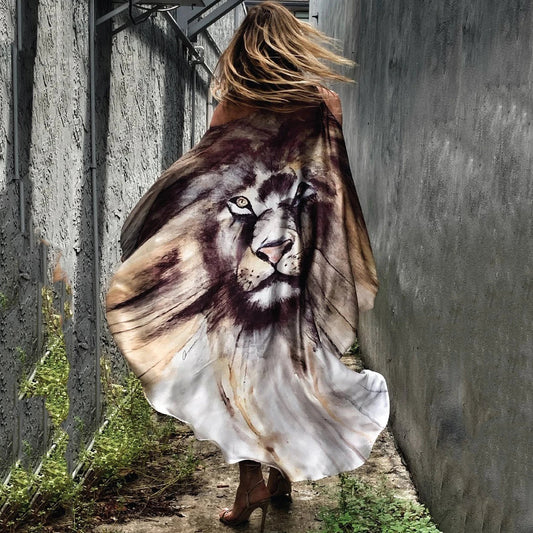 A chic inclined shoulder printed dress in a vibrant colour with a large, swinging skirt