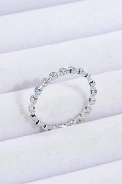 Elegant 925 sterling silver ring with natural moonstone centrepiece and zircon accents