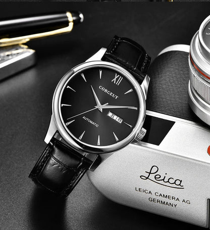A sophisticated automatic mechanical watch with a gold/white or gold/black face, stainless steel case, and genuine leather strap