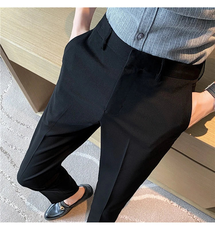 Premium men's suit trousers in a variety of colours, featuring a subtle textured drape and exceptional stretch for all-day comfort and style.
