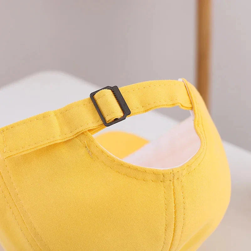 Adjustable cotton sun hat for kids with 'MOM+DAD=ME' embroidery, offering UV protection and breathable comfort