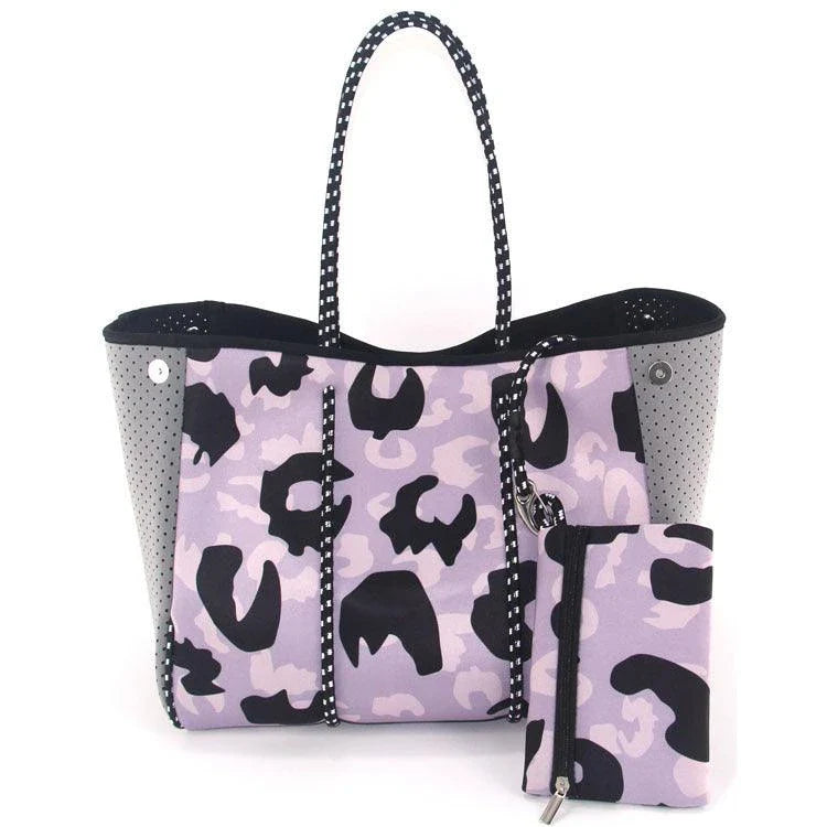 A neoprene beach bag in a stylish design, perfect for British summer adventures at the coast