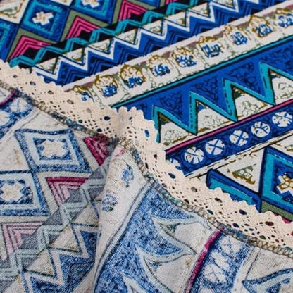 Elegant Bohemian-inspired dining tablecloth with intricate jacquard weave pattern in red colour