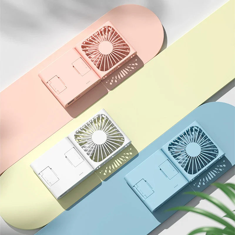 Compact portable USB power bank with built-in cooling fan, perfect for on-the-go use by British consumers