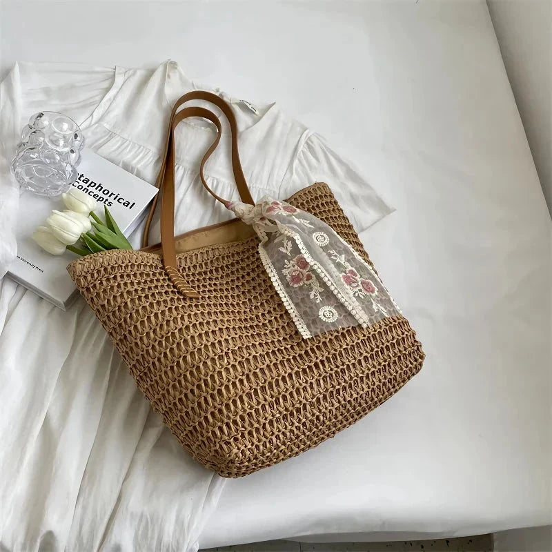 Elegant handcrafted woven straw tote bag in beige colour, perfect for summer outings and carrying essentials