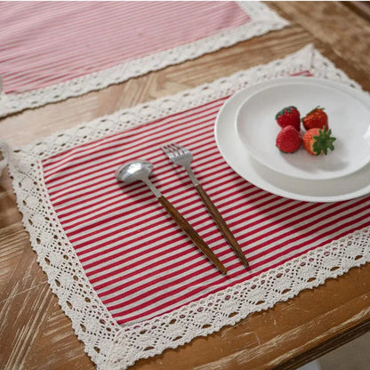 Elegant geometric lace placemats in red and blue stripes, designed to protect and decorate your dining table