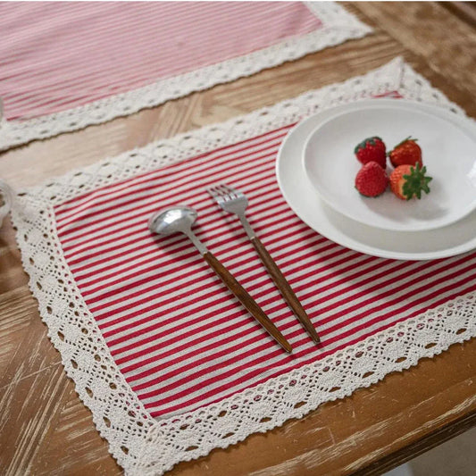 Elegant geometric lace placemats in red and blue stripes, designed to protect and decorate your dining table