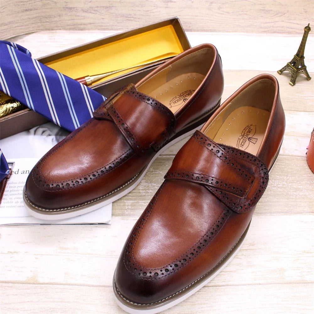 Premium handcrafted British leather casual loafers for men, featuring a round toe, flat heel, and durable rubber sole