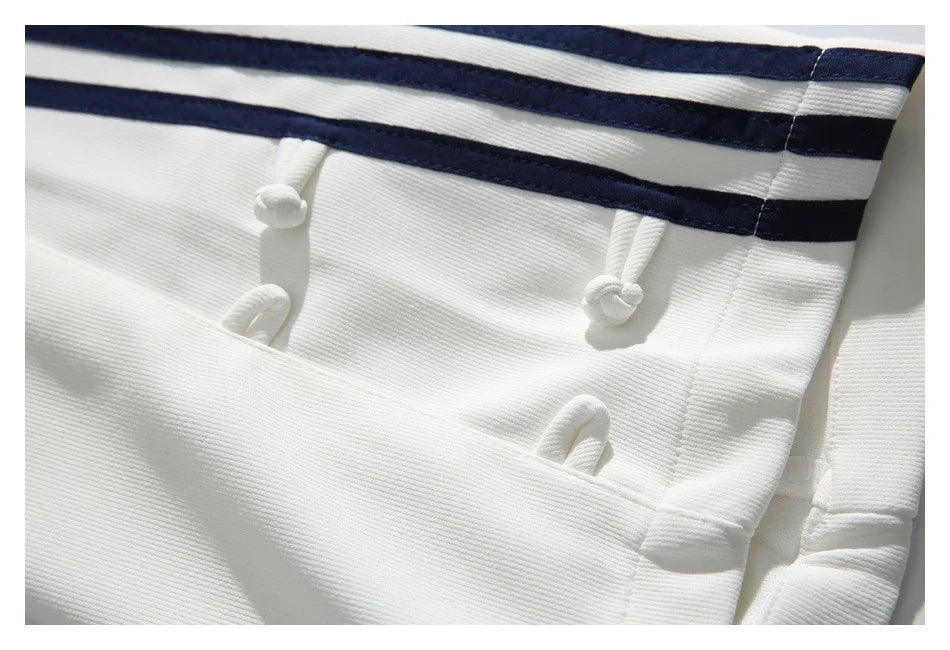 Stylish striped sports trousers in a relaxed, mid-waist design for versatile leisure and athletic wear