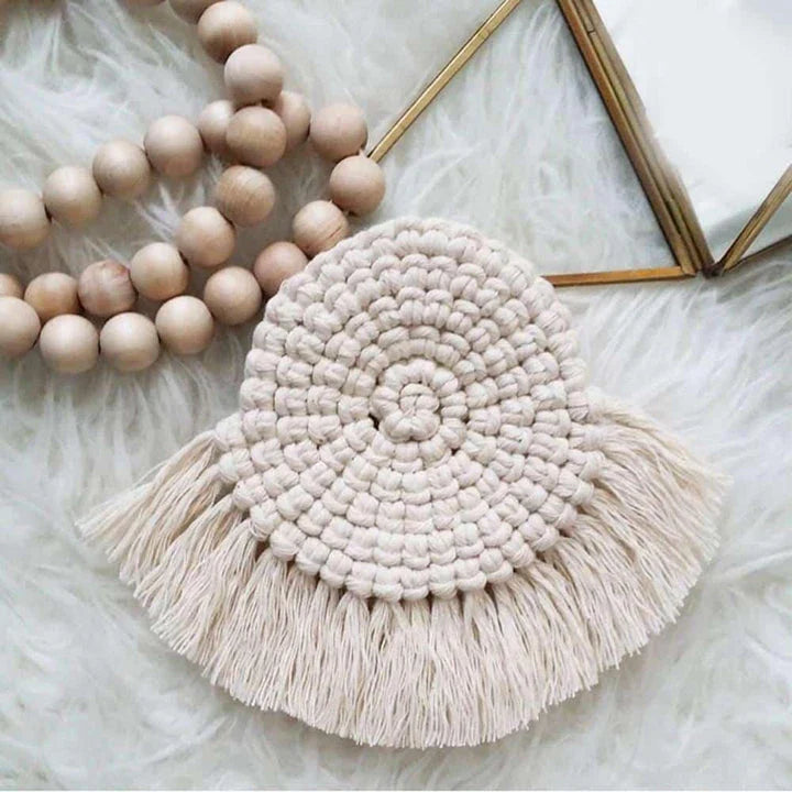 Elegant Boho Macrame Coaster in Timeless White, featuring a unique and artisanal design that adds a touch of rustic charm to any living space.