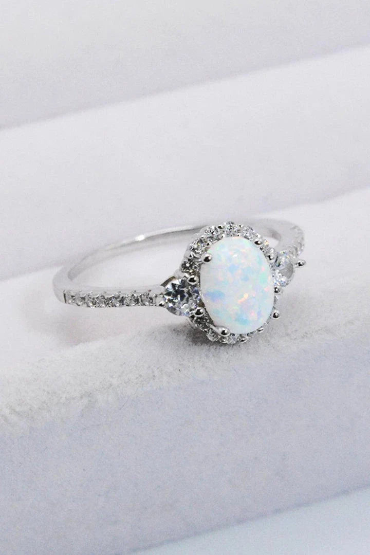 A stunning platinum-plated opal ring made from 925 sterling silver, featuring a modern and minimalist design