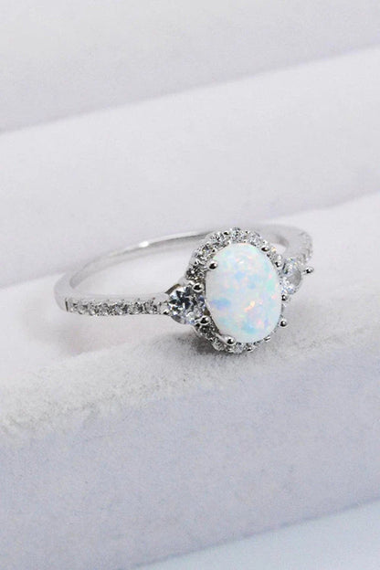 A stunning platinum-plated opal ring made from 925 sterling silver, featuring a modern and minimalist design