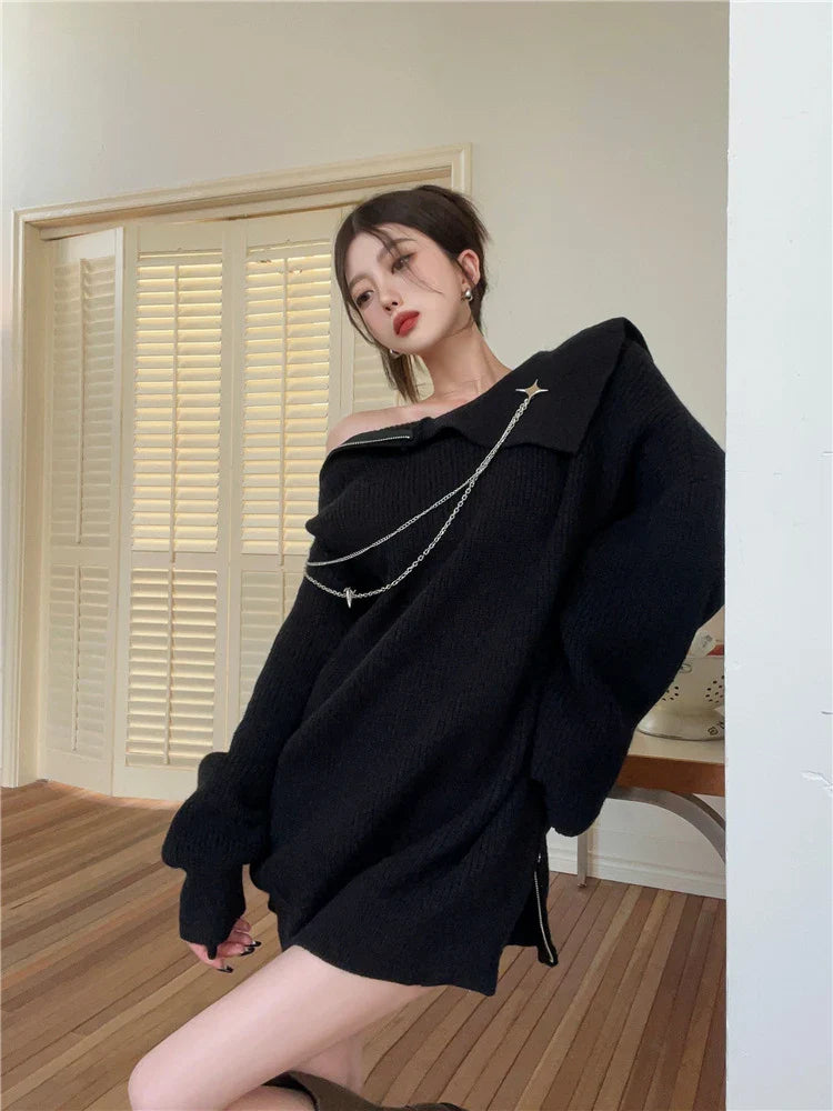 Luxurious off-the-shoulder zipper sweater in black and beige, featuring lantern sleeves and a cozy alpaca wool blend