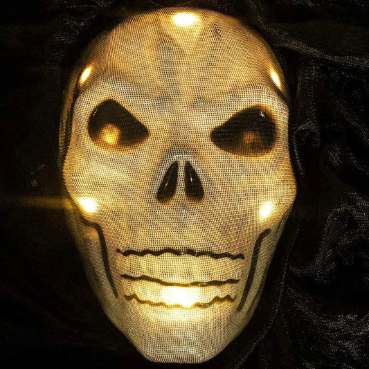 Voice-activated Halloween decoration with ghost-shaped design, lighting, and sound effects