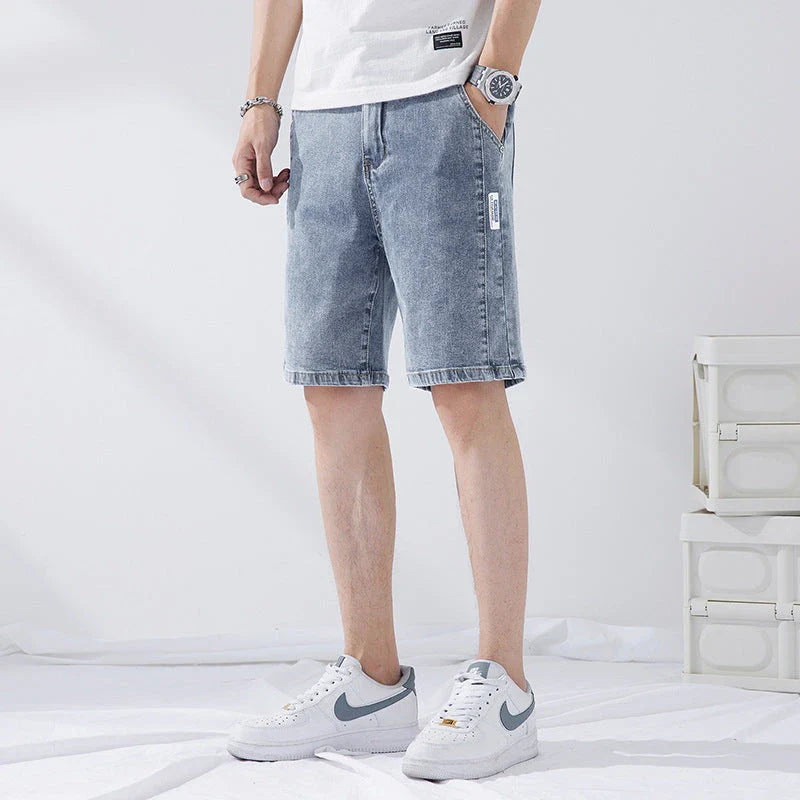 Premium straight-leg capri trousers in black, grey, blue grey, and light blue colours, featuring an elastic waistband and a durable, wrinkle-resistant fabric blend.