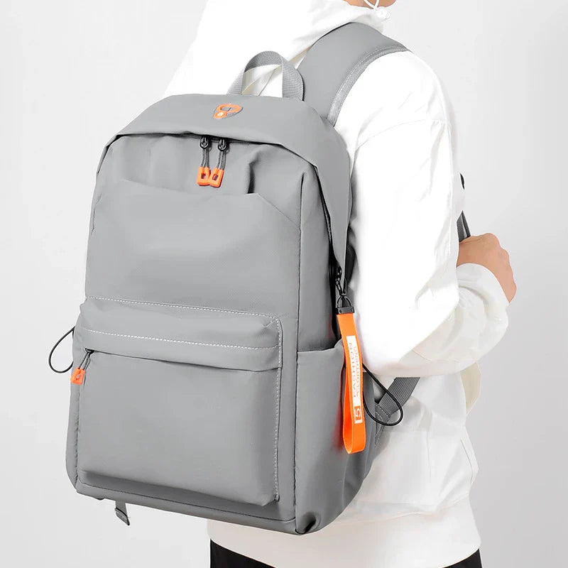 Premium casual laptop rucksack with adjustable, padded shoulder straps and dedicated laptop compartment for men's travel