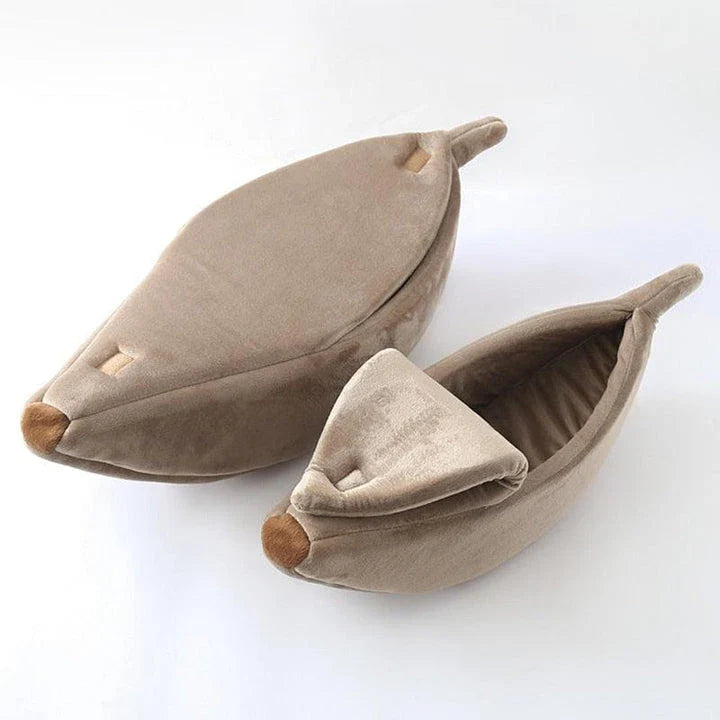 Cosy, plush banana-shaped cat bed in a variety of sizes, providing a comfortable retreat for feline friends