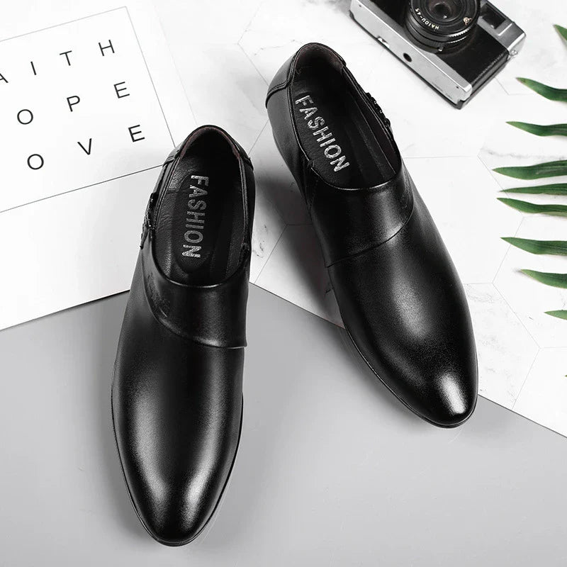 A pair of sophisticated men's leather shoes in black and brown, suitable for both casual and formal wear
