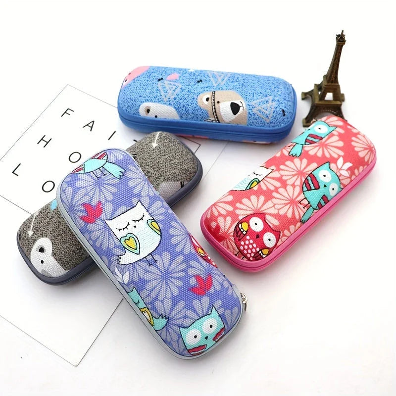Cartoon-themed zippered eyeglass case in pink colour, featuring a playful and protective design for children's eyewear