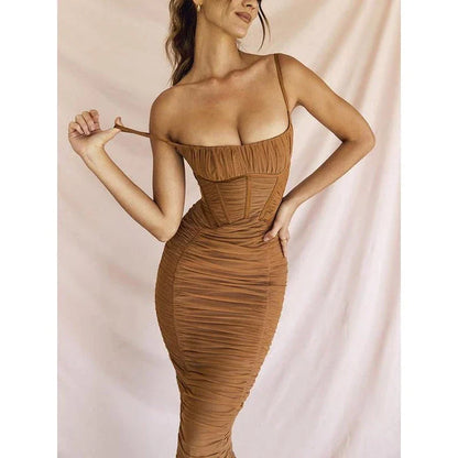 Elegant spaghetti strap backless maxi dress in black with ruched detailing and ankle-length cut