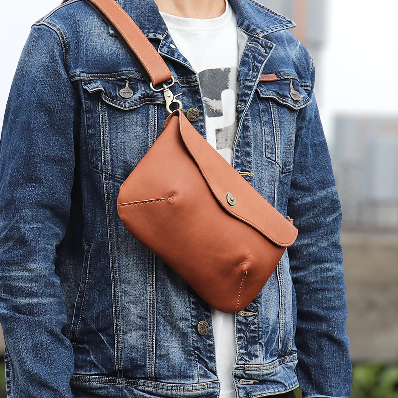 Premium handcrafted leather messenger bag in a classic British design, featuring a sturdy construction and spacious interior for the modern gentleman's everyday essentials.