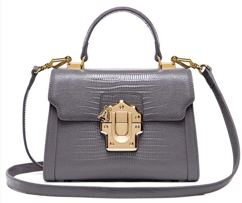 Stylish one-shoulder oblique back handbag in various colours, crafted with premium cowhide leather for timeless British elegance