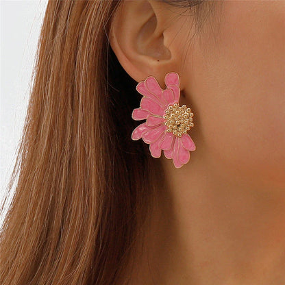 Vibrant, multi-coloured floral petal stud earrings with a blend of bohemian and modern influences