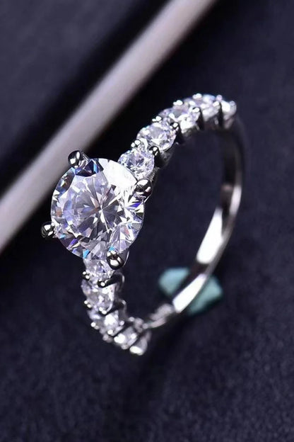 Exquisite 2-carat moissanite solitaire ring in 925 sterling silver, featuring a mesmerising centre stone and delicate metalwork for a modern, minimalist design.