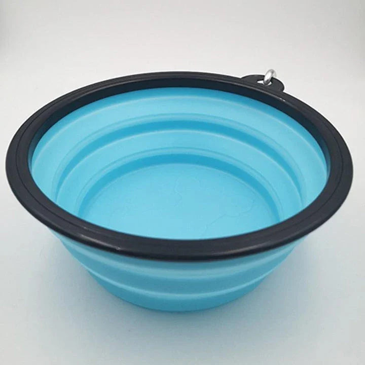 A collapsible pet silicone bowl in black, with a large 350 ml capacity, designed for outdoor adventures with your furry friend.