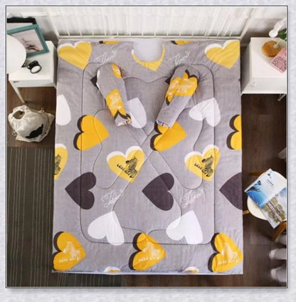 A cosy, wearable quilt with sleeves in a variety of colourful designs, perfect for staying warm and comfortable during the winter months.