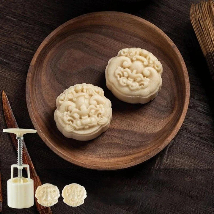 A hand-pressed chocolate stamping tool made of durable plastic, designed to add a personal touch to homemade chocolates, cakes, and baked goods.