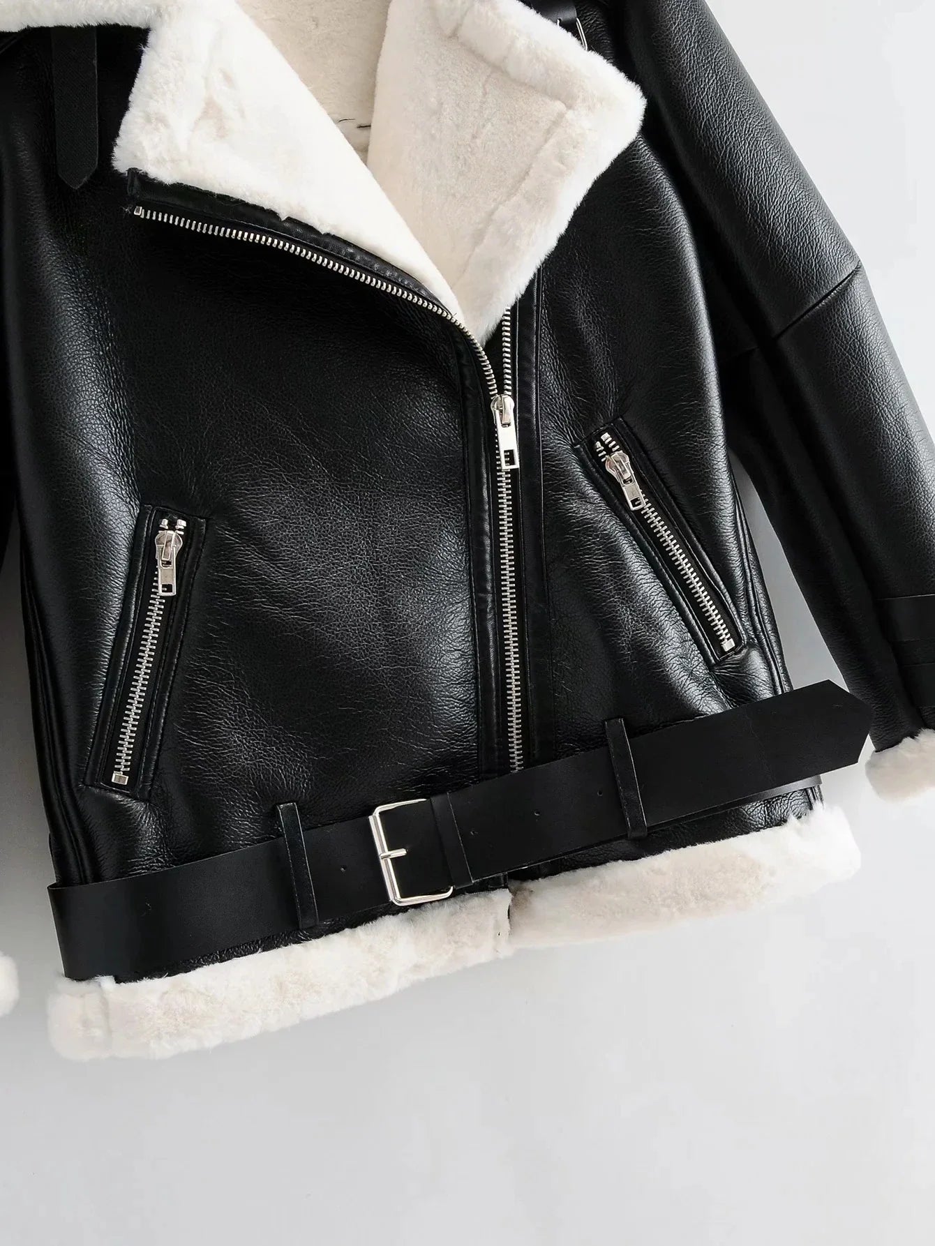 Warm faux leather jacket with plush faux fur lining, available in classic British colours for autumn and winter wear.