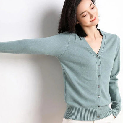 Chic v-neck single breasted cardigan in blue, green, and pink colours with a sophisticated and timeless design