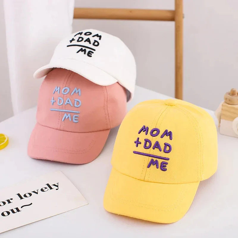 Adjustable cotton sun hat for kids with 'MOM+DAD=ME' embroidery, offering UV protection and breathable comfort
