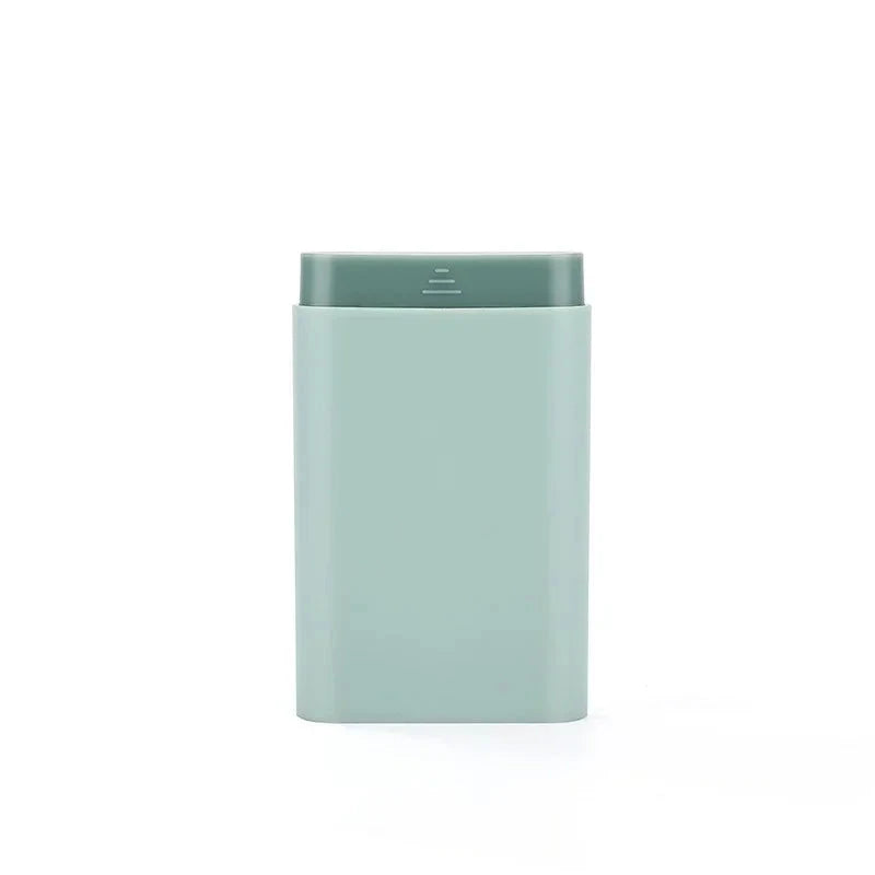 Compact 7-day portable pill organiser with six grids for storing daily medications, supplements, and vitamins