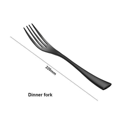 A stylish set of black stainless steel flatware, including a teaspoon, knife, and fork, on a white background.
