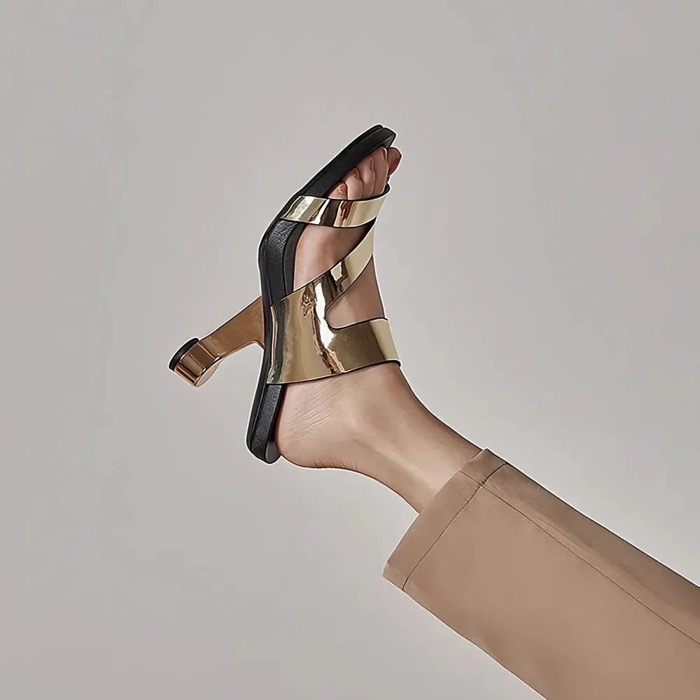Genuine leather high heel slides with a unique and distinctive design, perfect for summer fashion and comfort.