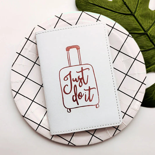 Premium PU leather passport cover in rose gold colour with subtle letter pattern, designed for stylish and organised travel