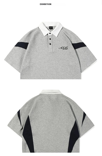 Melange grey polo shirt with contrast stitching, designed and made in Britain for comfortable summer wear