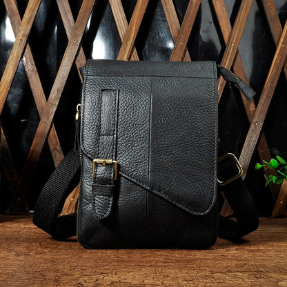 Premium cowhide leather one-shoulder crossbody bag in light grey colour with adjustable strap and zipper pocket