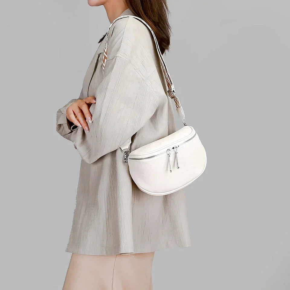 Premium genuine leather tote bag with adjustable strap and interior compartments for fashion-forward women