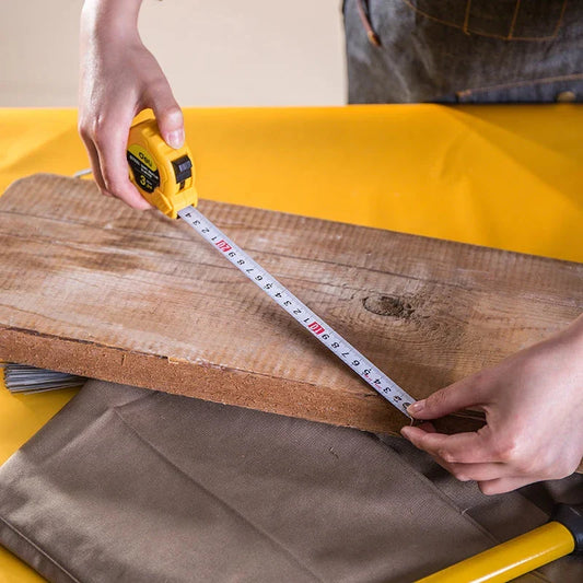 A durable and precise tape measure with a tough ABS case, high-quality steel blade, and innovative features for accurate measurements in any UK project.