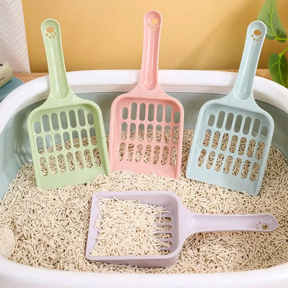 A large, high-quality cat litter scoop made of durable plastic with a hollow design for efficient cleaning.